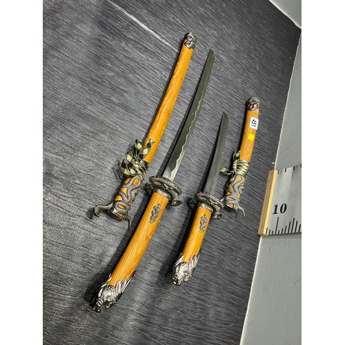 451 - 2 Samurai swords in sheaths