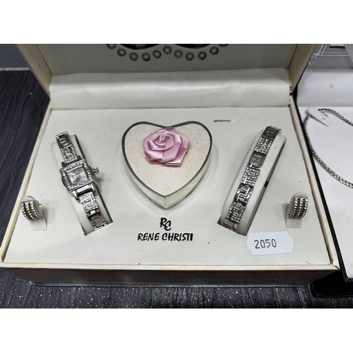 513 - 2 boxed sets ladies watches bracelets earrings