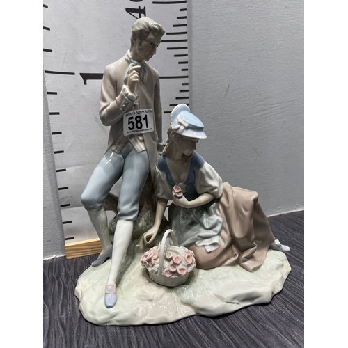 581 - Lladro man & woman seated