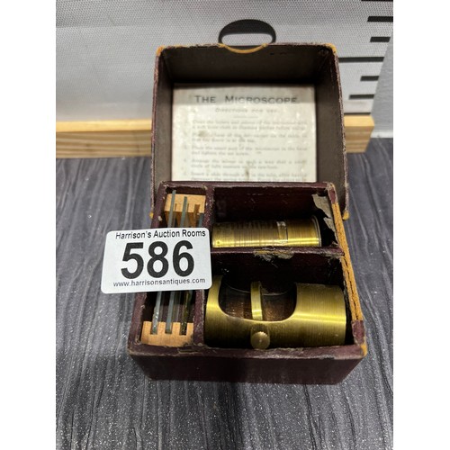 586 - Vintage brass microscope in original box