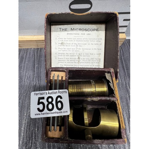 586 - Vintage brass microscope in original box