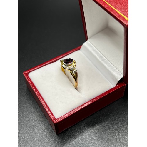 556 - Gold on silver dress ring with red stone Size P