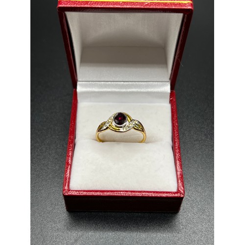 556 - Gold on silver dress ring with red stone Size P