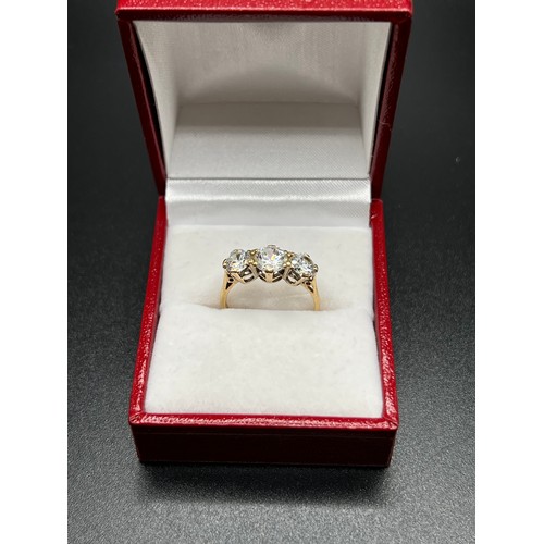 559 - 9ct gold 3 stone dress ring size L 2.4g gross