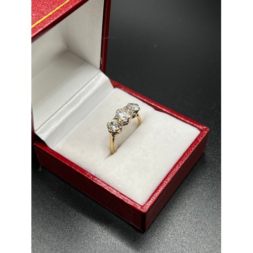 559 - 9ct gold 3 stone dress ring size L 2.4g gross