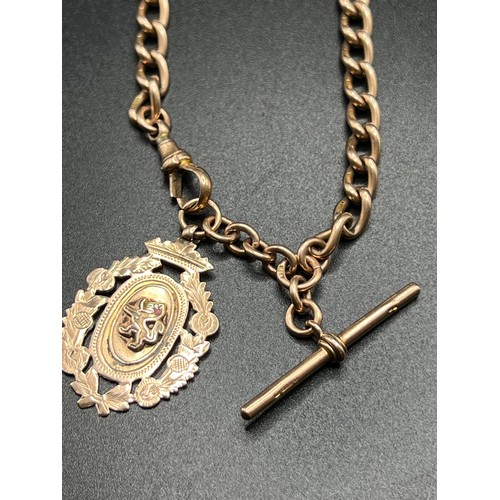 569 - Heavy 9ct rose gold Double Albert chain with shield 51 grams