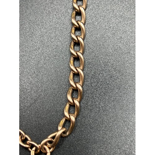 569 - Heavy 9ct rose gold Double Albert chain with shield 51 grams