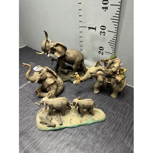 137 - 4 Elephant figures