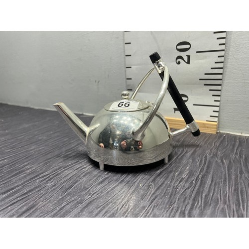 66 - Silver plated dresser teapot