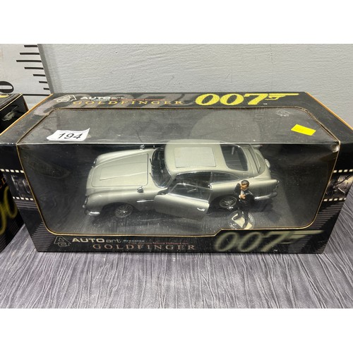 194 - 2 James bond 007 Aston martin gold finger cars