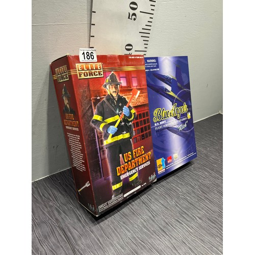 186 - 2 Boxed flight force figures USA Navy, USA fire dept