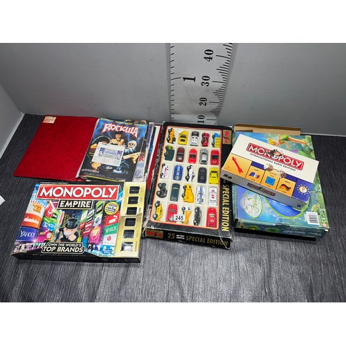 245 - 3 Vintage boxed games, folder posters + box 25 special edition cars