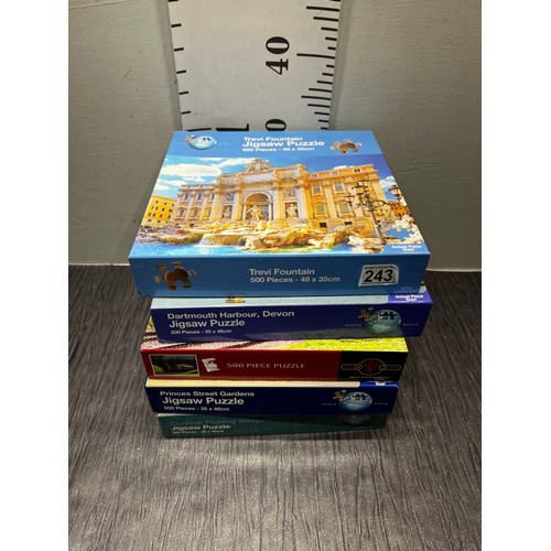 243 - 5 Boxed jigsaws