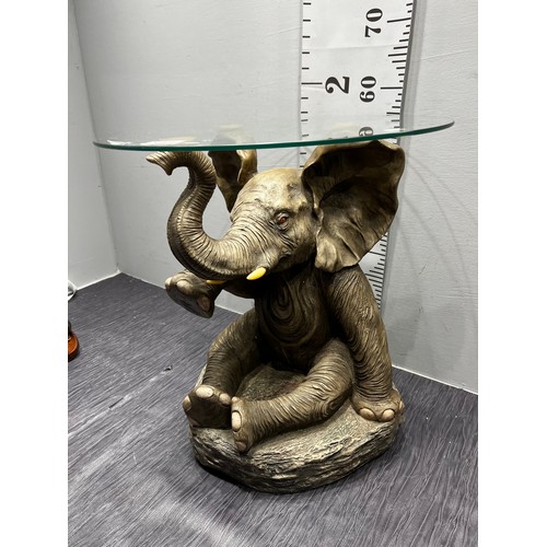 318 - Elephant glass top table