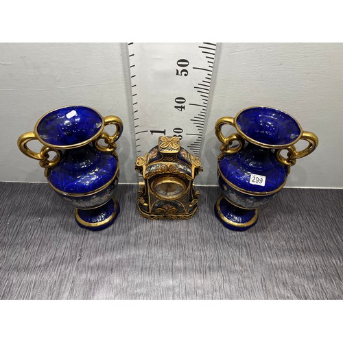 299 - 3 Piece blue garniture set clock & 2 vases