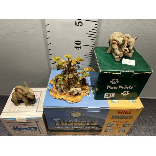 281 - 3 Tuskers elephants boxed