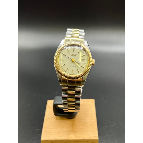 562 - Longines automatic 2 tone 14 carat/steel ladies watch