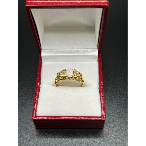 554 - 18ct Gold opal & diamond ring 5.5g gross size M/N