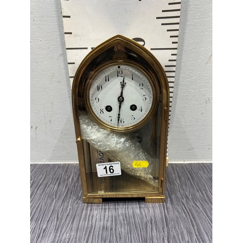 16 - Unusual Victorian Brass french arched mantle clock with bevel glass front door