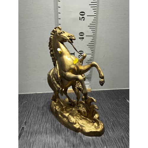 383 - Metal horse and rider sculpture