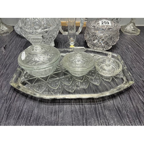 259 - Quantity cut glass, decanters dressing table set etc