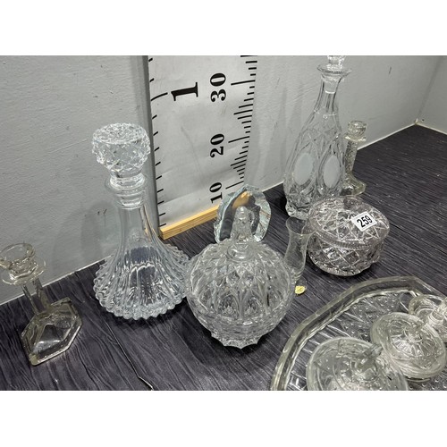 259 - Quantity cut glass, decanters dressing table set etc