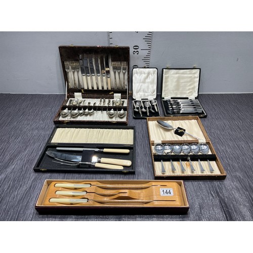 144 - 5 vintage boxes assorted cutlery