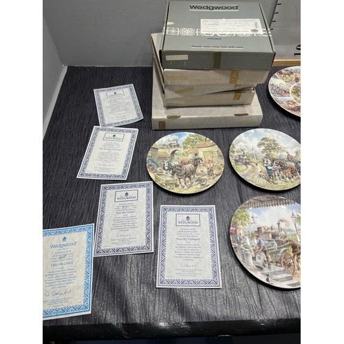 121 - 9 wedgwood train wall plates with cerificates and boxes