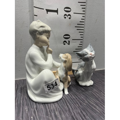 534 - 2 Lladro figures cat, boy with dog