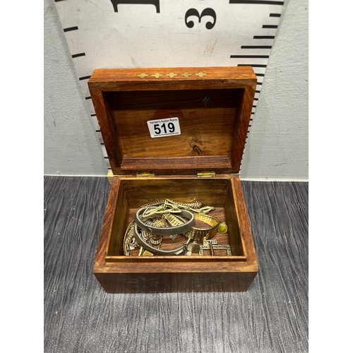 519 - Wooden brass inalid casket with jewellery