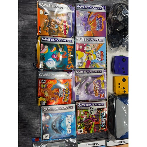 255 - Game boys x3 + case + 2 camera, games, cables, booklets