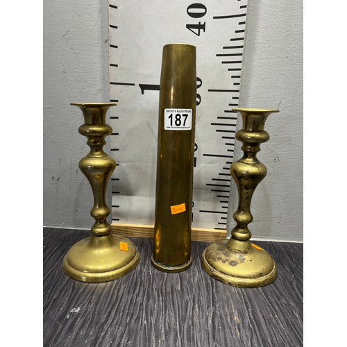 187 - Pair brass candlesticks + 1953 shell case vase