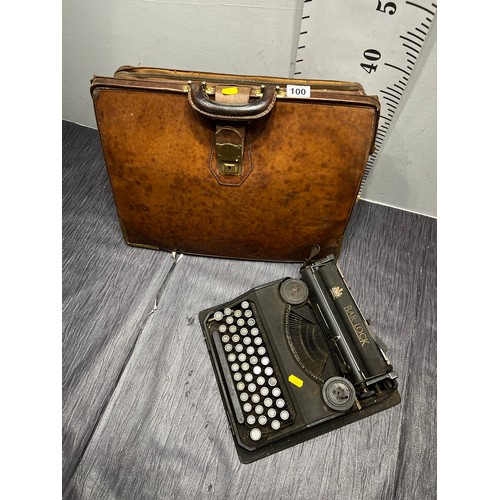 100 - Brown leather leather briefcase + vintage typewriter