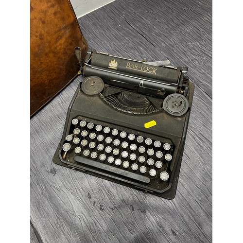 100 - Brown leather leather briefcase + vintage typewriter