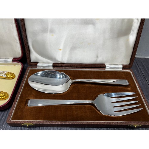 154 - Royal crown derby china handled salad servers in case + 1 other set