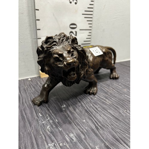 140 - Bronze lion figure