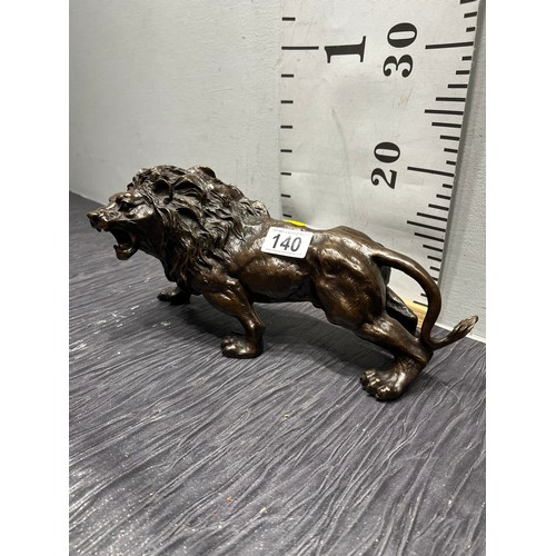 140 - Bronze lion figure