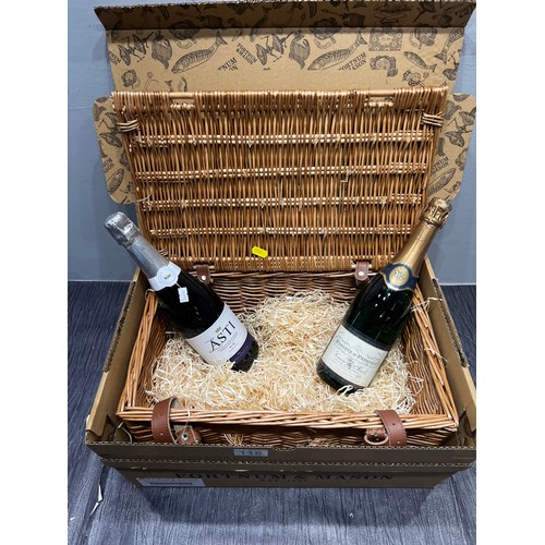 116 - Fortnum & masons wicker basket with 2 bottles wine