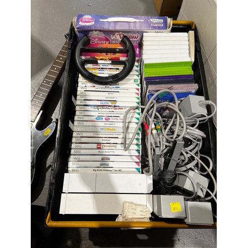 631 - box of Nintendo Wii consoles, games, Wii fit and Mario kart including guitar game