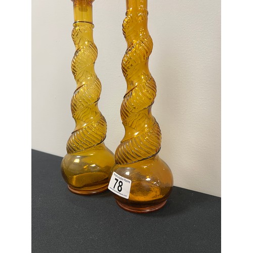 78 - Pair amber glass twisted decanters