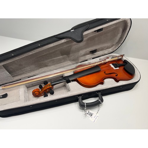 209 - 1/4 Size violin in case with b&w never used