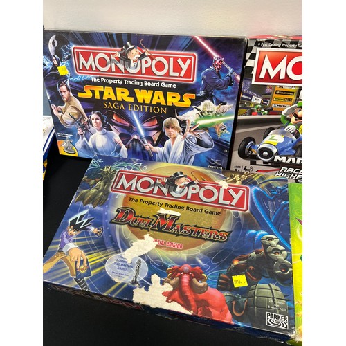 401 - 5 Monopoly games, Mario starwars, sky landers etc