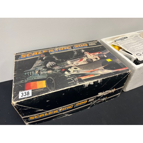 338 - Vintage scalextric 200 racing car game in original box