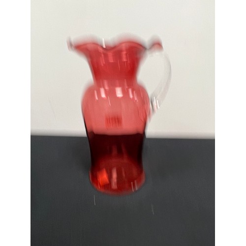 450 - Large vintage cranberry glass fluted jug