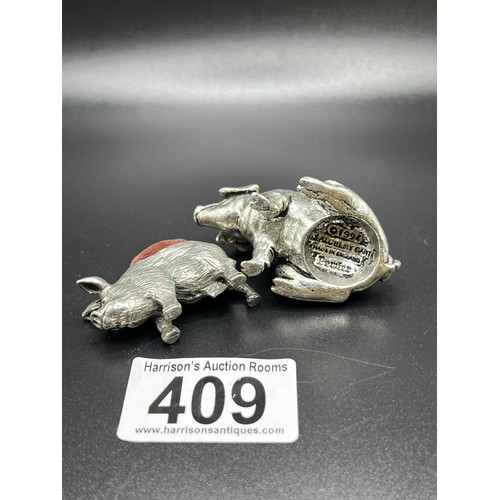 409 - 2 Pig white metal vintage pin cushions