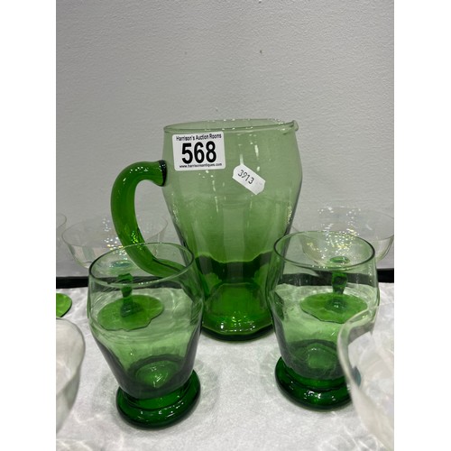 568 - Green glass jug & glasses tray not inc