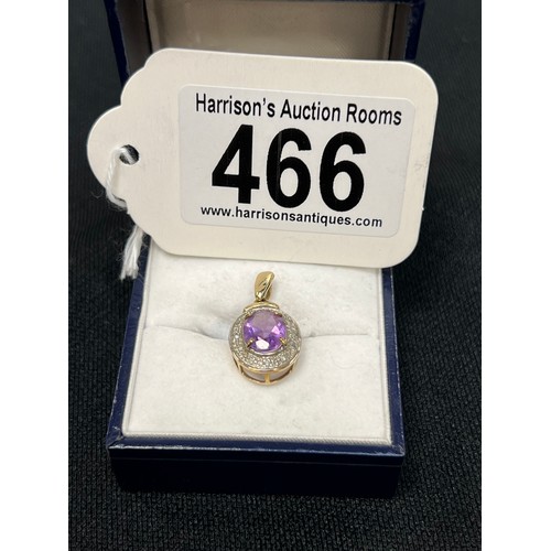 466 - 9ct Gold amethyst & diamond pendant 1.6g gross