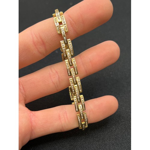 462 - 9ct Gold & diamond bracelet 13.7g gross