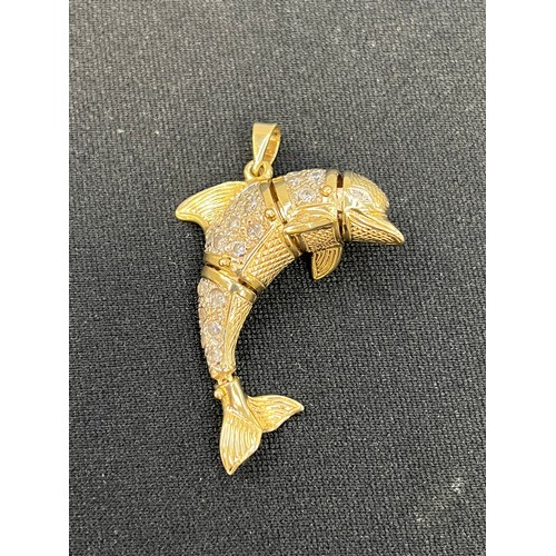 450A - 9ct Gold articulated dolphin pendant 24.8g Grams gross