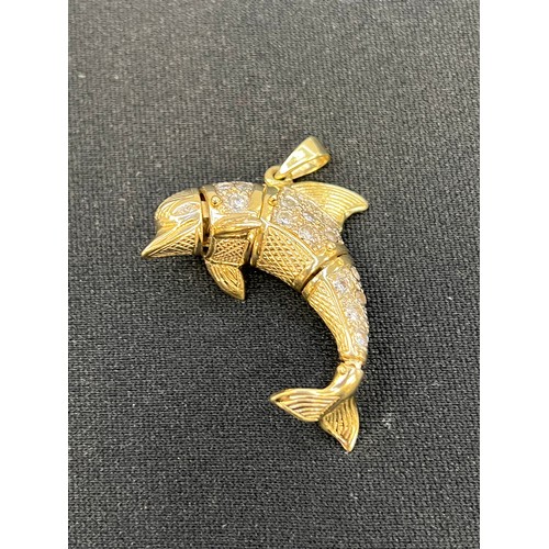 450A - 9ct Gold articulated dolphin pendant 24.8g Grams gross